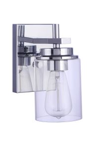 Part of the Reeves - 17405 Vanity Collection, this modern wall sconce features a clear glass shade and striking filament bulb, ideal for vanities. It is elegantly mounted on a sleek rectangular chrome backplate.