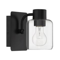 Part of the Rori - 17705 Collection, this modern black wall sconce showcases a rectangular base and curved arm with a clear glass shade. Its transitional design blends an exposed bulb with industrial and contemporary elements seamlessly.