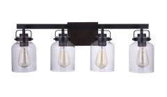 The Foxwood - 53604-FBDT is a modern light fixture featuring four clear glass lantern-style shades with exposed bulbs on a rectangular dark metal base, embodying an industrial aesthetic ideal for transitional decor.