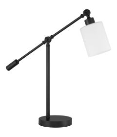 Meet the Indiana - 87011 Desk Lamp, a sleek modern design with a black frame and clear glass shade. Its adjustable arm has two joints for easy light direction, while the round base complements its minimalist style, ideal for any contemporary workspace.