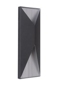 The Peak - Z3412 is a modern, rectangular wall-mounted light fixture with a sleek angular design. Ideal for exteriors, its dark surface with lighter recessed sections offers a striking geometric look. The light is currently off.