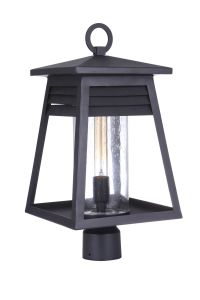 The Becca - ZA2725-TB is a black, modern outdoor lantern with a slanted roof and clear glass encasing. Featuring a textured matte black finish, sleek design, metal frame, and top loop for hanging—perfect for adding casual coastal charm to any space.