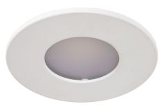 Close-up of the LED Flushmount - X9105-W-LED, a round white recessed low-profile downlight with a frosted cover. Its minimalist, energy-efficient design blends into the white background when turned off and is JA8/Title 24 compliant for quality assurance.