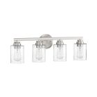 The Bolden - 50504 is a four-light bathroom vanity fixture with bold, clean lines and a brushed nickel finish. It features clear seeded glass shades with elongated bulbs on a symmetrical design, including a round wall mount and horizontal bar.