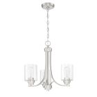 The Bolden - 50523 modern chandelier boasts a brushed nickel finish with three curved arms, each fitted with clear seeded glass shades revealing visible bulbs. Elegantly suspended by a decorative chain, it adds sophistication to any room.