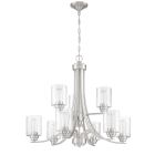 The Bolden - 50529 chandelier features a brushed nickel finish and nine clear seeded glass shades in two tiers. Each shade has a visible bulb, elegant curving arms, and is suspended by a chain.
