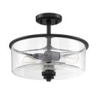 The Bolden - 50552 ceiling light fixture features a black metal finish and a clear seeded glass shade with two visible bulbs inside, offering a modern, sleek design.