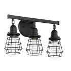 The Thatcher - 50603 is a black, industrial-inspired three-light wall sconce featuring clear glass bulbs in metal wire shades. It has a rectangular mounting plate with a dark finish, combining contemporary design and vintage appeal.