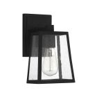 The Dunn - ZA4304-TB is a modern wall-mounted light fixture with a textured black rectangular metal frame and clear glass panels. It features a vintage-style bulb with visible filament, providing transitional charm. Ideal as an outdoor lantern, it stands