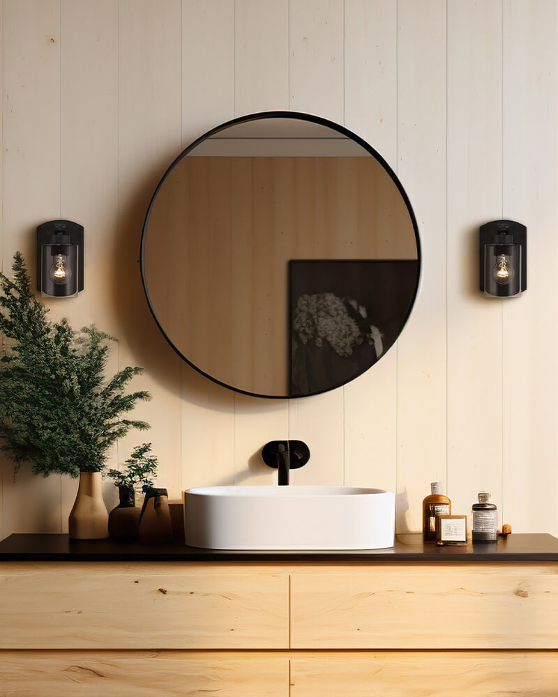 Hendrix bathroom sconce in black by Craftmade